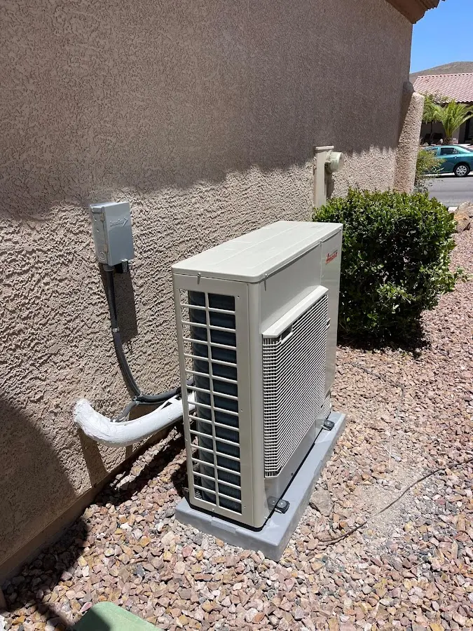 Residential air conditioning condenser unit in Plainville